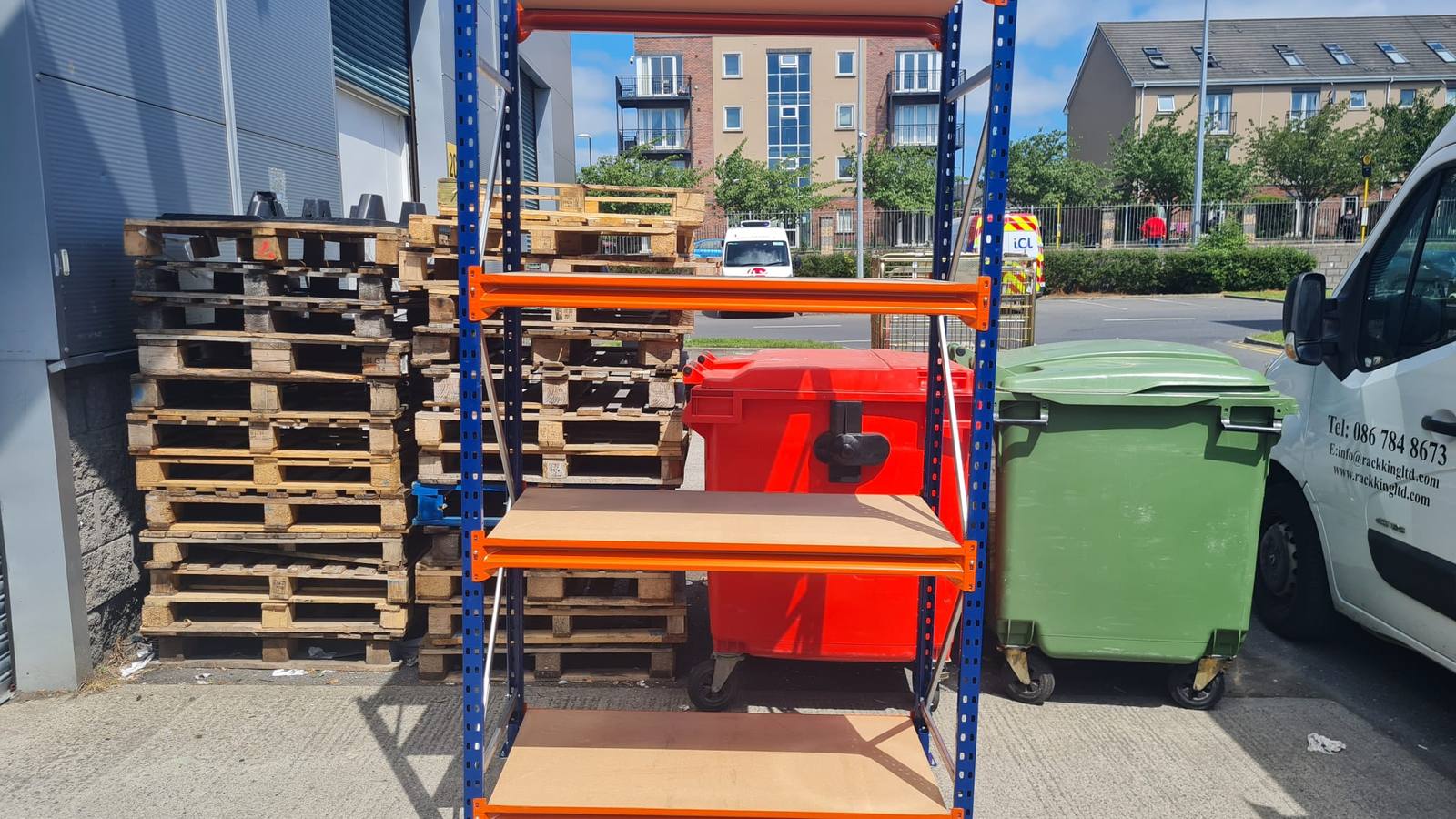 Mobile long span shelving bays on castors outside a warehouse